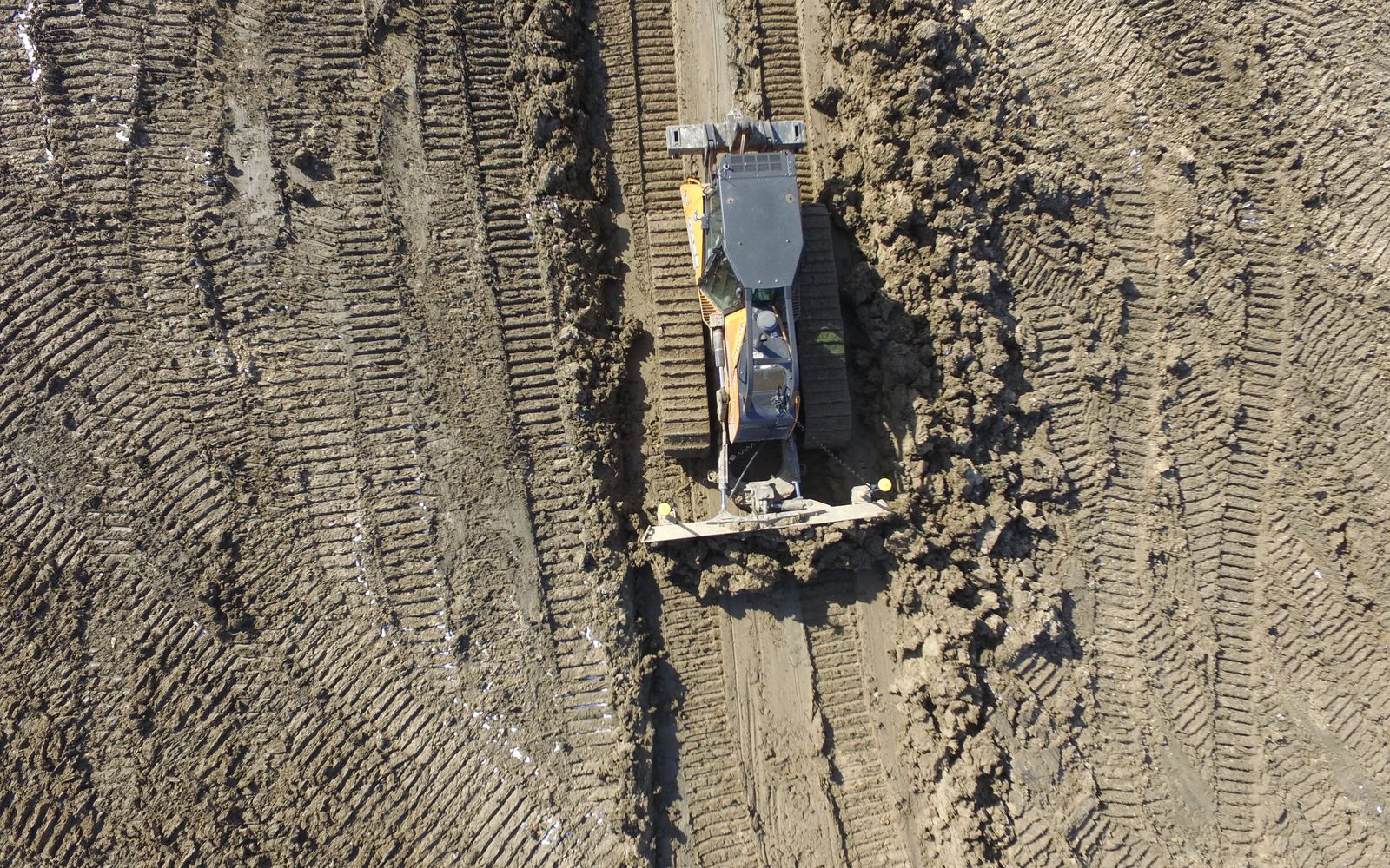 Drone view looking down on a dozer grading to level