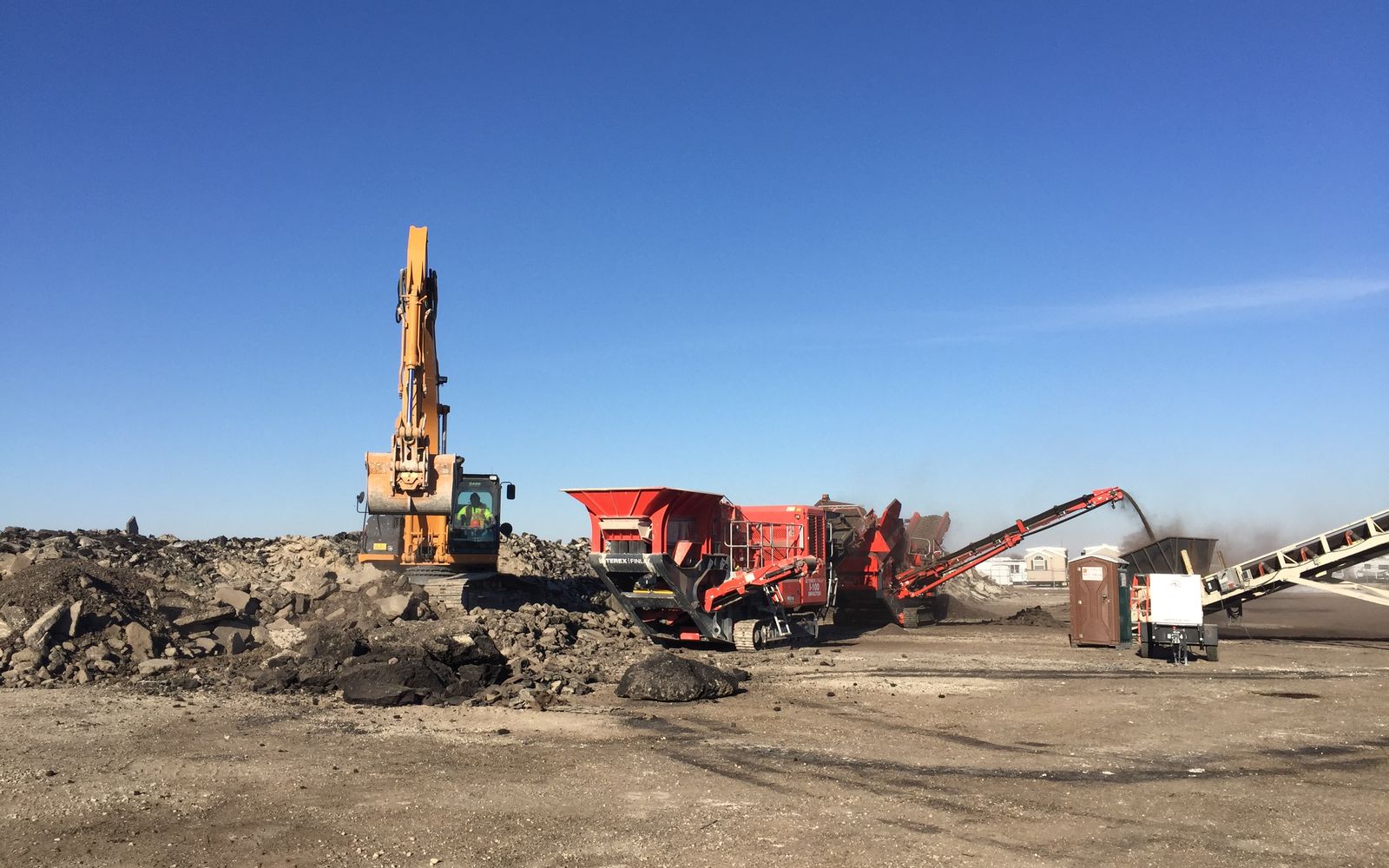The full crusher spread working, conveyor discharging