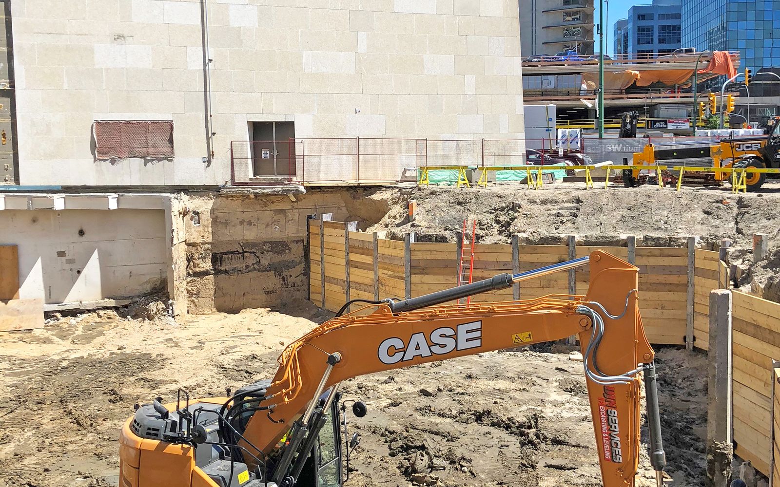 DJN crew and machine in a shored excavation
